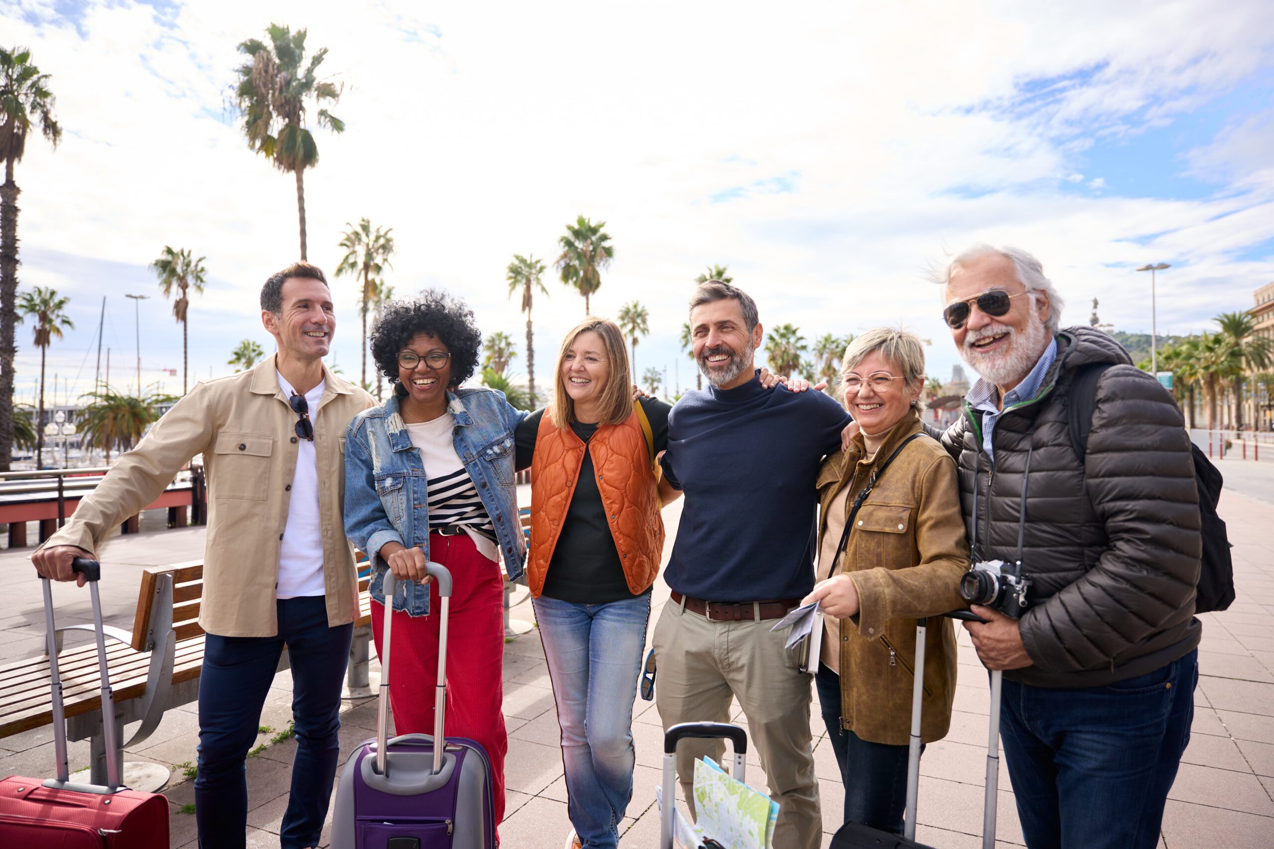 group-smiling-middle-aged-diverse-friends-posing-hugging-looking-side (1)