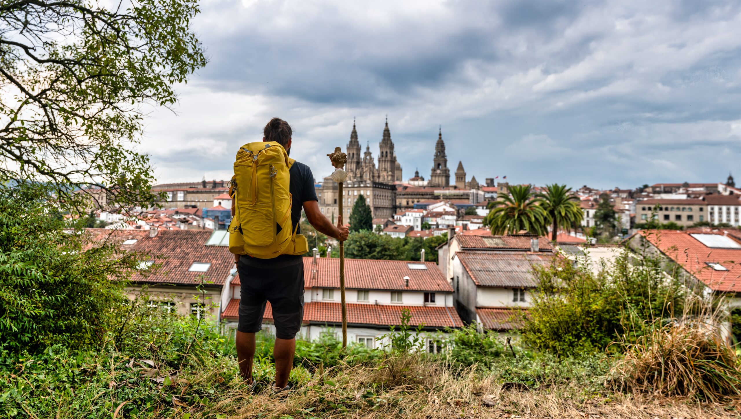 pilgrim-arriving-from-camino-de-santiago-de-compostela-spain-view-from-cathedral (1)