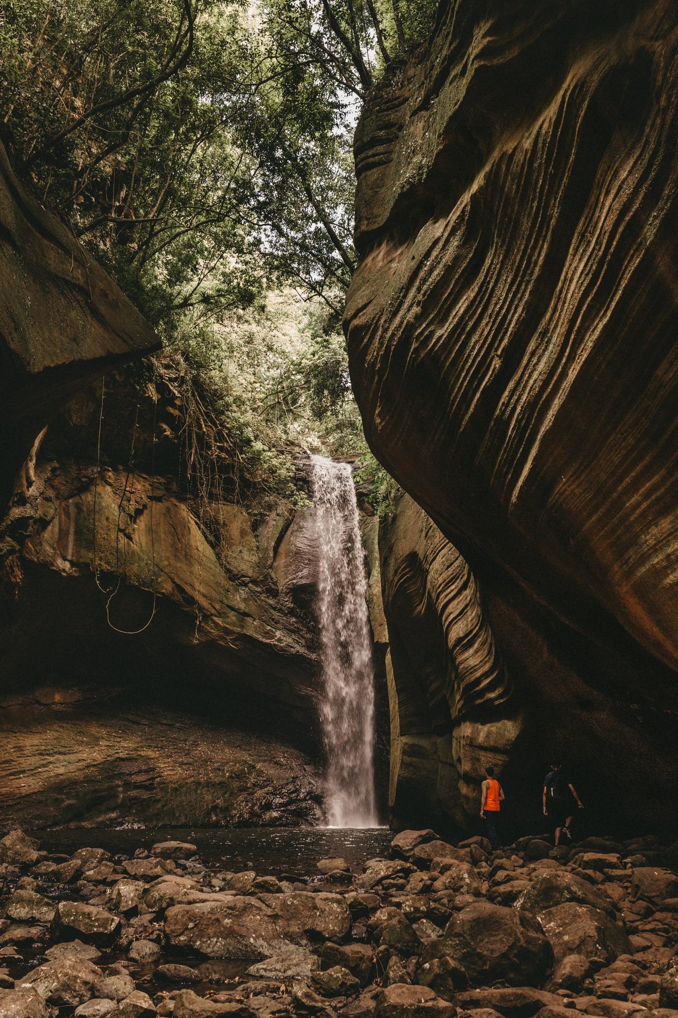 waterfalls-near-rocky-cave-photo (1)